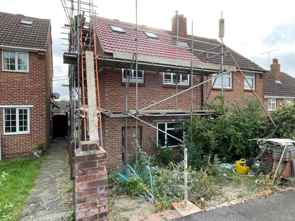 Lot: 134 - SEMI-DETACHED PROPERTY WITH DEVELOPMENT OPPORTUNITY TO BE COMPLETED - Existing front view of 57 Bower Road Hextable